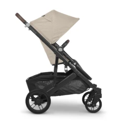 Uppababy CRUZ V2 + FREE SNUG SEAT + CUP HOLDER - Liam (Oat Melange/carbon/chestnut Leather) PRE ORDER APRIL 13 Uppababy CRUZ V2 + FREE SNUG SEAT + CUP HOLDER - Liam (Oat Melange/carbon/chestnut Leather) PRE ORDER APRIL -METRO BABY SHOP CRUZ23 LIM Side HandleLeft