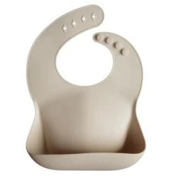Mushie Silicone Bib VARIOUS COLOURS -METRO BABY SHOP NEW shiftingsand 600x 78e71f37 38d9 472a 8c24 91e3e64771ad