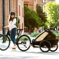 Thule Chariot Cab - 2 Seat Multisport Bike Trailer Aluminium/Cypress Green -METRO BABY SHOP thule chariot cab 2 cypress green lifestyle 1