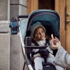 Thule Spring Cup Holder -METRO BABY SHOP thule spring cup holder lifestyle